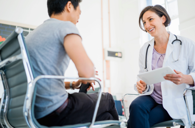 A doctor talking to a patient