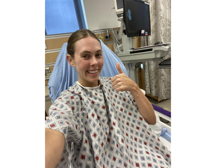 Woman in exam room after colonoscopy