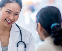 Doctor speaking with patient