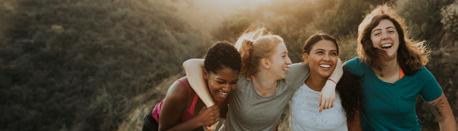 Women having fun while hiking.