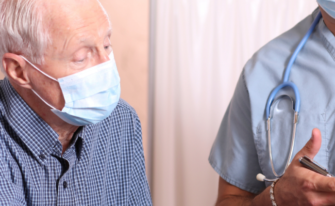 man talking to doctor